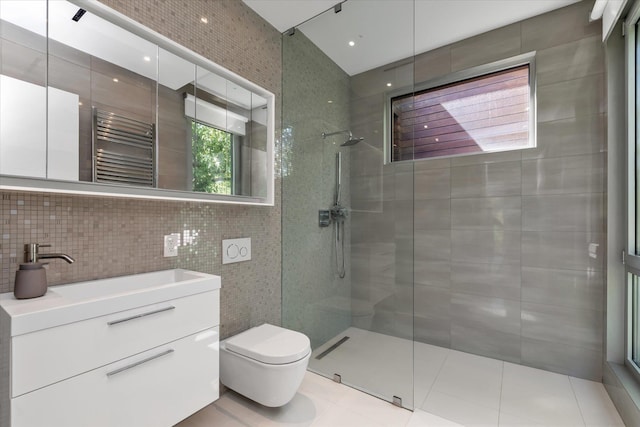 1555 Stevenson Rd, Hewlett, NY 11557 - full bath featuring tile walls, radiator, walk in shower, vanity, and a towel warmer
