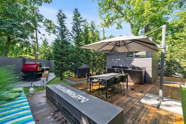 1555 Stevenson Rd, Hewlett, NY 11557 - deck featuring an outdoor fire pit, area for grilling, and outdoor dining area