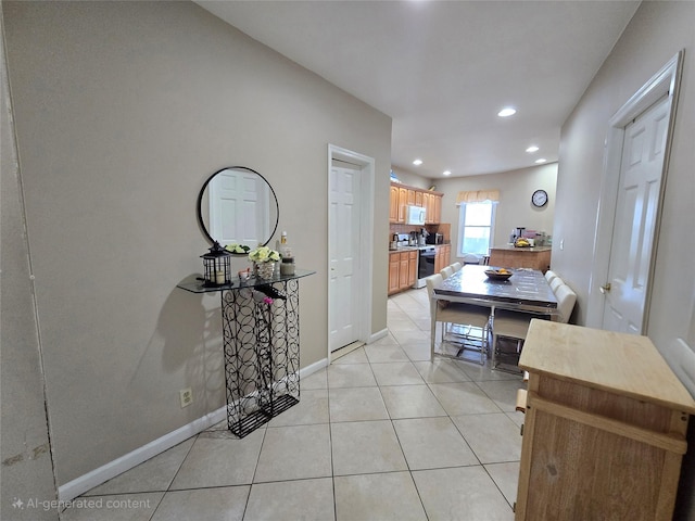 7622 60th Ln, Glendale, NY 11385 - dining room featuring light tile patterned floors and recessed lighting