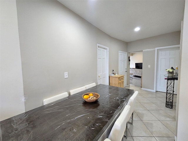 7622 60th Ln, Glendale, NY 11385 - dining room featuring light tile patterned floors and baseboards