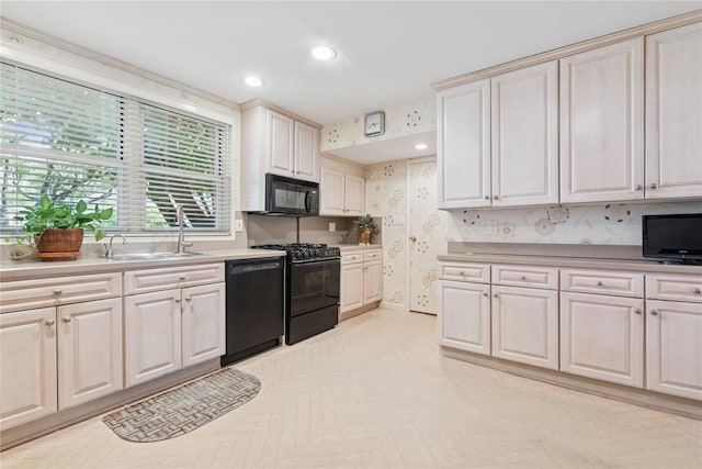 1390 Broadway Unit 118, Hewlett, NY 11557 - kitchen with black appliances, light countertops, and recessed lighting