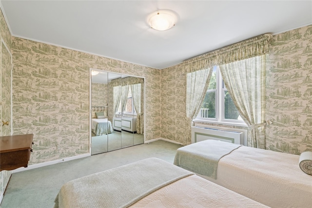 1390 Broadway Unit 118, Hewlett, NY 11557 - carpeted bedroom featuring wallpapered walls and multiple windows