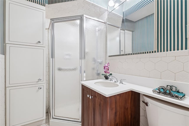 1390 Broadway Unit 118, Hewlett, NY 11557 - bathroom featuring vanity, a stall shower, tile walls, and wallpapered walls