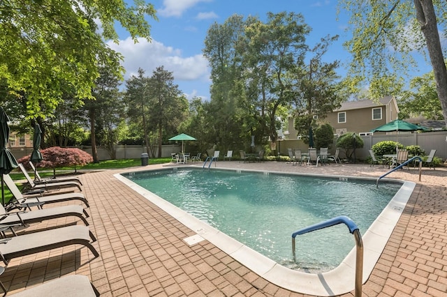 1390 Broadway Unit 118, Hewlett, NY 11557 - community pool featuring a patio area
