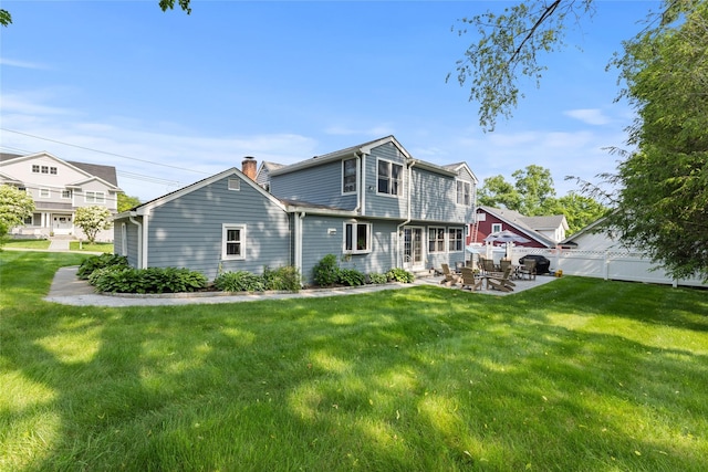 37 Rutland St, Mount Kisco, NY 10549 - back of house featuring a patio area and a chimney
