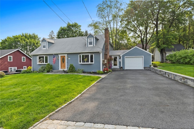 37 Rutland St, Mount Kisco, NY 10549 - view of front of property with asphalt driveway, a chimney, a front lawn, and a garage