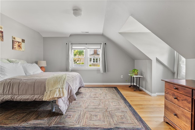 37 Rutland St, Mount Kisco, NY 10549 - bedroom featuring light wood-type flooring and vaulted ceiling