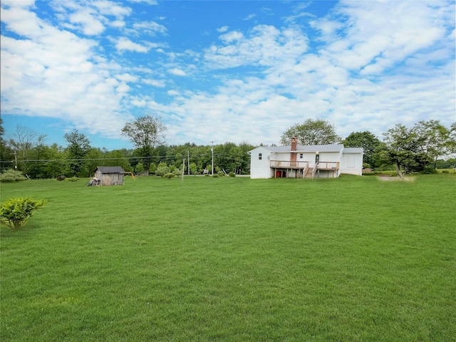 811 Happy Ave, Swan Lake, NY 12783 - view of grassy yard with an outbuilding