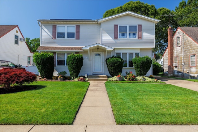100 Virginia St, Valley Stream, NY 11580 - view of front of house with a front yard