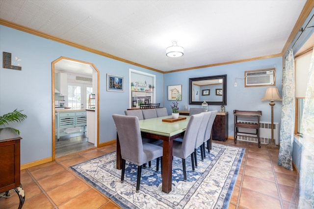 100 Virginia St, Valley Stream, NY 11580 - dining area featuring arched walkways, a wall mounted AC, ornamental molding, and light tile patterned floors