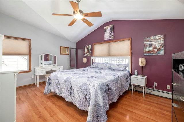 100 Virginia St, Valley Stream, NY 11580 - bedroom with baseboard heating, lofted ceiling, light wood-style flooring, and a ceiling fan