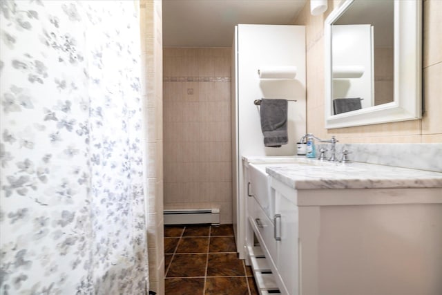 100 Virginia St, Valley Stream, NY 11580 - full bathroom with a baseboard heating unit, vanity, tile patterned floors, and a shower with shower curtain