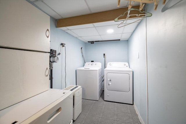 100 Virginia St, Valley Stream, NY 11580 - laundry room featuring separate washer and dryer and light tile patterned floors