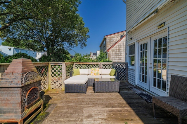 100 Virginia St, Valley Stream, NY 11580 - wooden terrace featuring french doors and outdoor lounge area