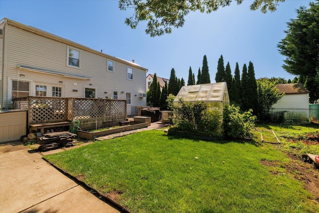 100 Virginia St, Valley Stream, NY 11580 - view of yard featuring an exterior structure, a garden, and an outdoor structure