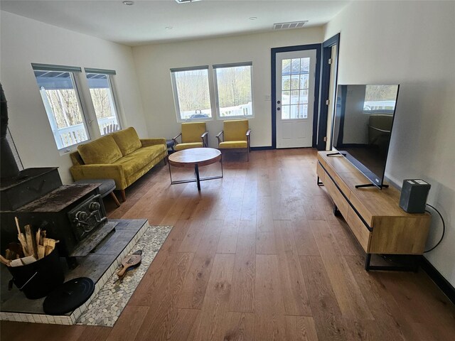 470 Shaver Hill Rd, Andes, NY 13731 - living room featuring healthy amount of natural light, hardwood / wood-style floors, and baseboards