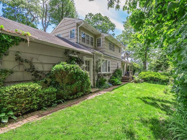 44 Glenwood Rd, Glen Head, NY 11545 - back of house featuring a lawn