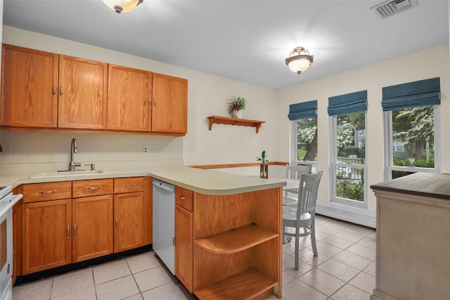 14 Bleakley Dr Unit 14, Peekskill, NY 10566 - kitchen with open shelves, dishwasher, a peninsula, backsplash, and light tile patterned flooring