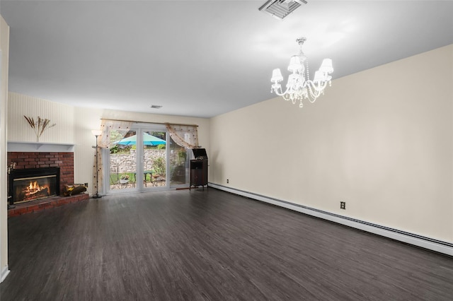 14 Bleakley Dr Unit 14, Peekskill, NY 10566 - unfurnished living room with wood finished floors, baseboard heating, a chandelier, and a fireplace