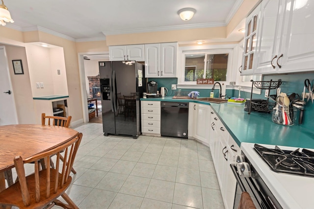 29 Ravenwood Dr, Kings Park, NY 11754 - kitchen with black appliances, a sink, light tile patterned floors, crown molding, and white cabinetry