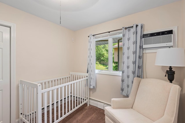 29 Ravenwood Dr, Kings Park, NY 11754 - bedroom with a baseboard radiator, carpet floors, a crib, and a wall mounted AC