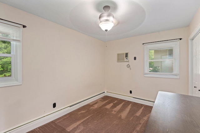 29 Ravenwood Dr, Kings Park, NY 11754 - laundry area with dark colored carpet, a wall mounted air conditioner, ceiling fan, and baseboard heating