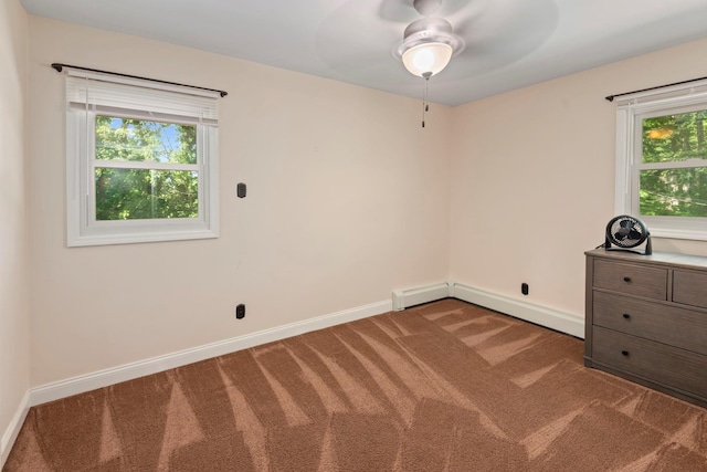 29 Ravenwood Dr, Kings Park, NY 11754 - unfurnished room with carpet flooring, ceiling fan, plenty of natural light, and baseboards