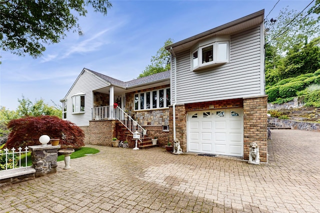 81 Avondale Rd, Yonkers, NY 10710 - view of front of property featuring an attached garage and decorative driveway