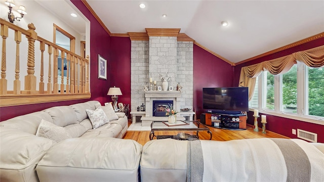 81 Avondale Rd, Yonkers, NY 10710 - living area featuring crown molding, wood finished floors, a fireplace, lofted ceiling, and recessed lighting