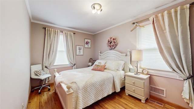 81 Avondale Rd, Yonkers, NY 10710 - bedroom featuring crown molding and light wood-style floors