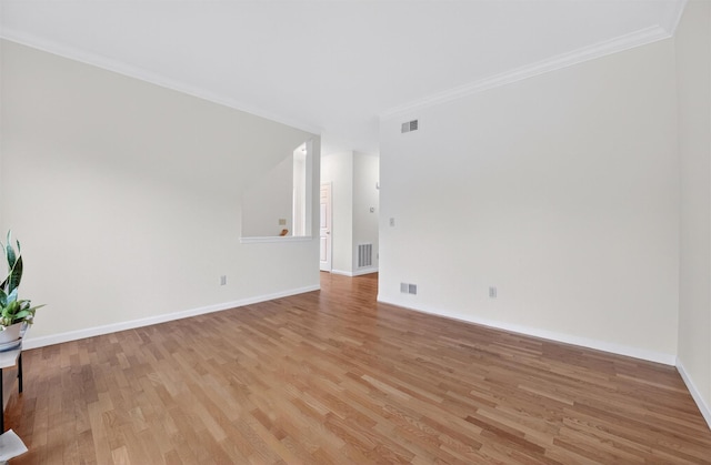 28 Winhaven Ct Unit 20, Highland Falls, NY 10928 - spare room featuring light wood-type flooring and ornamental molding