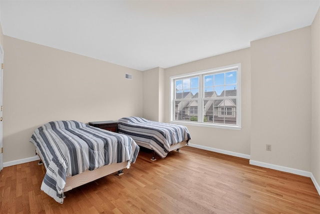 28 Winhaven Ct Unit 20, Highland Falls, NY 10928 - bedroom with baseboards and wood finished floors