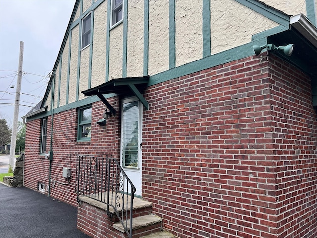 8 Alexine Ave, East Rockaway, NY 11518 - view of side of property with brick siding