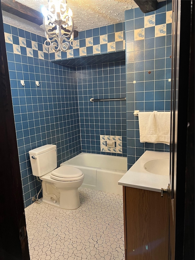 8 Alexine Ave, East Rockaway, NY 11518 - bathroom featuring tile walls, vanity, toilet, a bathtub, and a chandelier