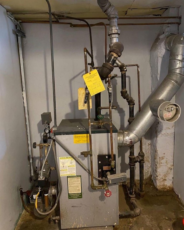 6910 68th St, Glendale, NY 11385 - utilities with a heating unit