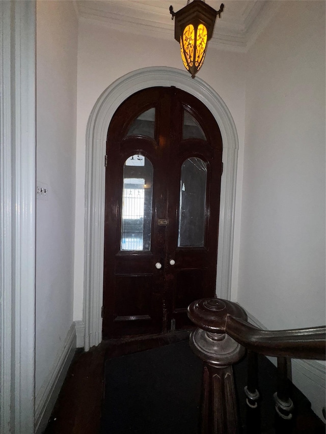 21 Jefferson St, Brooklyn, NY 11206 - entryway with arched walkways, crown molding, and wood finished floors