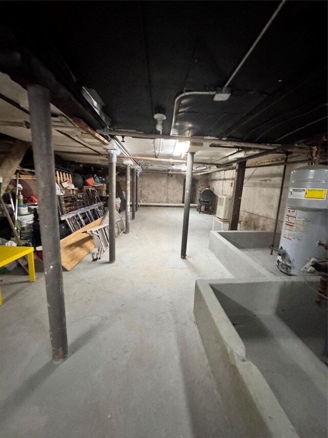 21 Jefferson St, Brooklyn, NY 11206 - unfinished basement with water heater