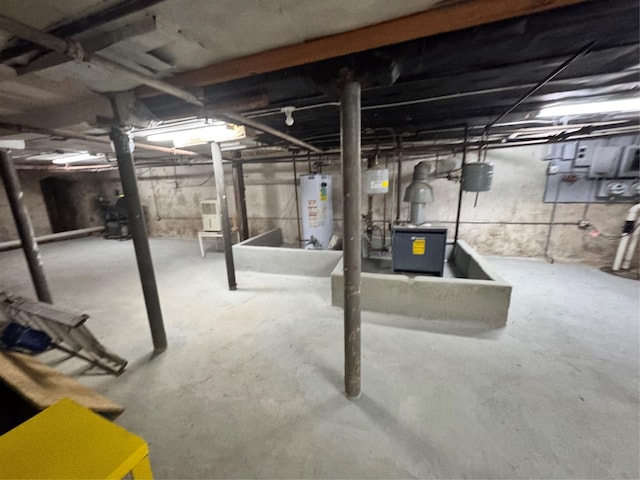 21 Jefferson St, Brooklyn, NY 11206 - unfinished below grade area featuring gas water heater and a heating unit