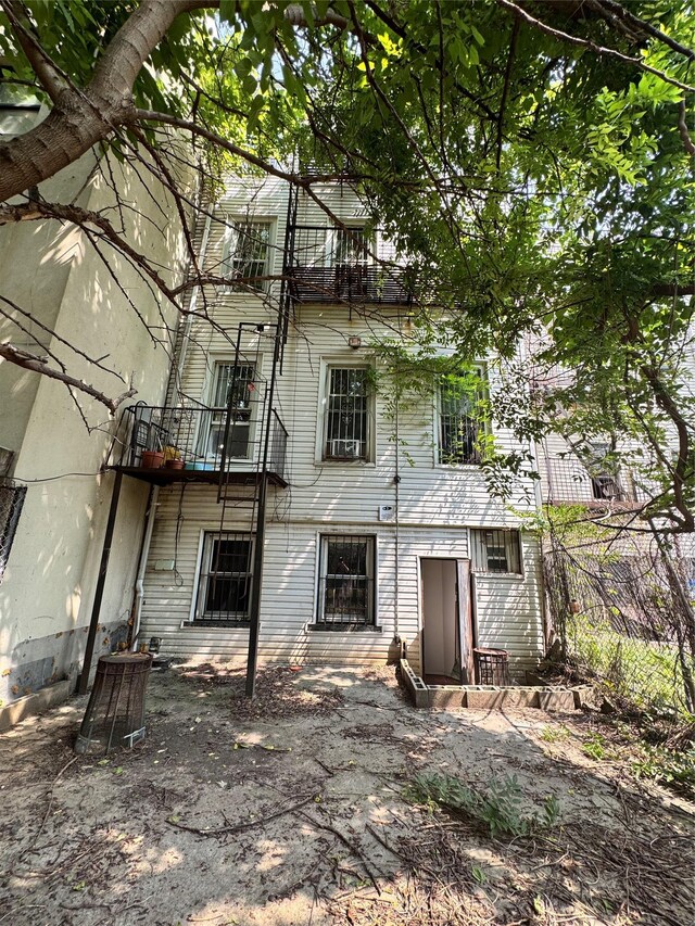 21 Jefferson St, Brooklyn, NY 11206 - back of house with a balcony