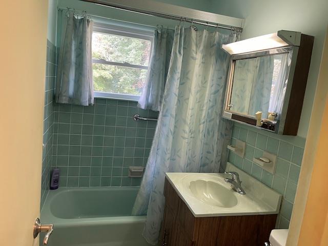 23 Elm St, Garnerville, NY 10923 - bathroom featuring vanity and shower / bathtub combination with curtain