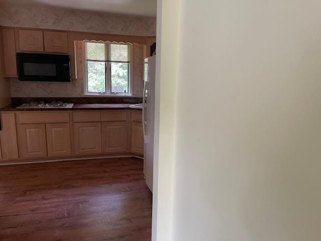 23 Elm St, Garnerville, NY 10923 - kitchen featuring black microwave, wood finished floors, gas cooktop, and dark countertops