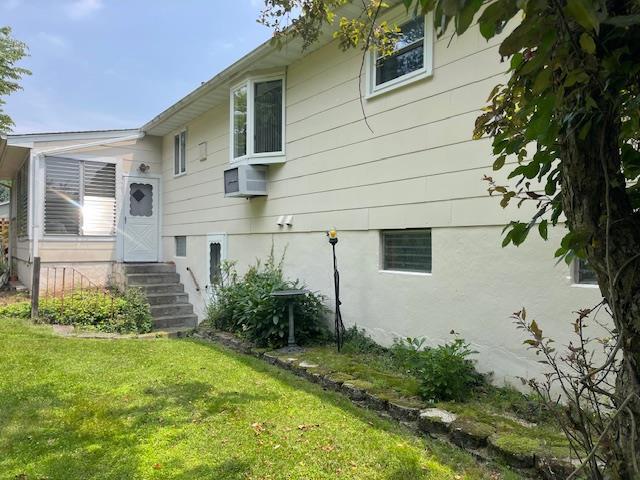 23 Elm St, Garnerville, NY 10923 - view of property exterior featuring a yard
