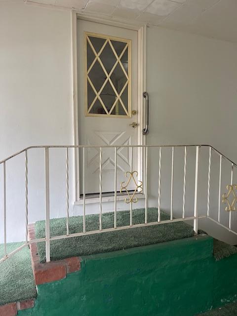 23 Elm St, Garnerville, NY 10923 - property entrance with stucco siding