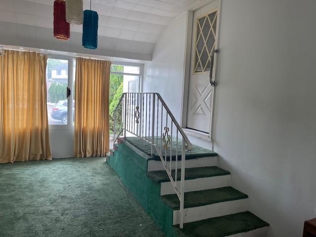 23 Elm St, Garnerville, NY 10923 - stairs featuring carpet and lofted ceiling