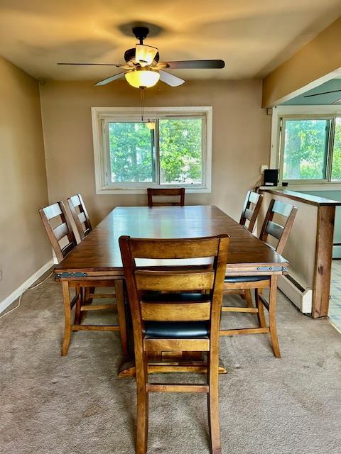 25 Waldron Dr, Stony Point, NY 10980 - dining room with carpet flooring, a ceiling fan, healthy amount of natural light, and a baseboard radiator