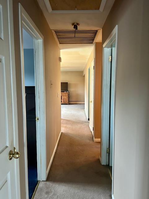 25 Waldron Dr, Stony Point, NY 10980 - hallway featuring carpet flooring and a baseboard radiator