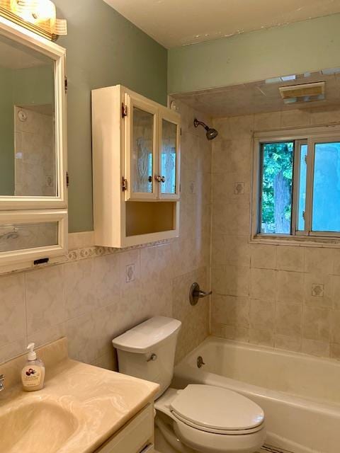 25 Waldron Dr, Stony Point, NY 10980 - bathroom featuring tub / shower combination, tile walls, and vanity