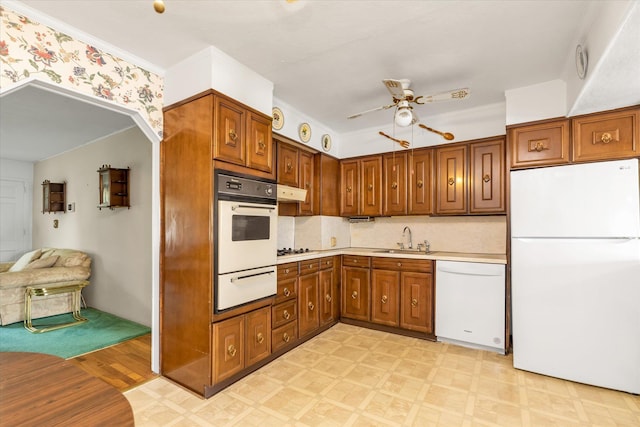 475 Emerson St, Uniondale, NY 11553 - kitchen with white appliances, a warming drawer, light flooring, light countertops, and ceiling fan