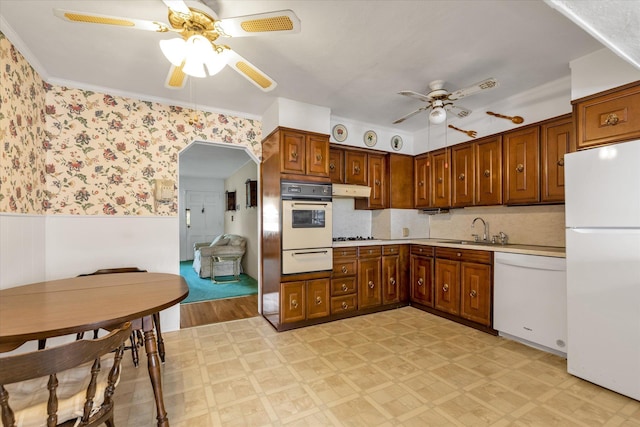 475 Emerson St, Uniondale, NY 11553 - kitchen featuring white appliances, ceiling fan, a warming drawer, light flooring, and wainscoting