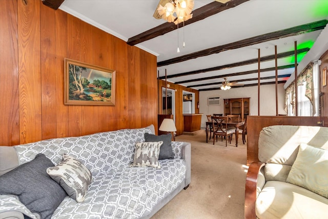 475 Emerson St, Uniondale, NY 11553 - living area with wooden walls, ceiling fan, carpet, beam ceiling, and a wall mounted air conditioner